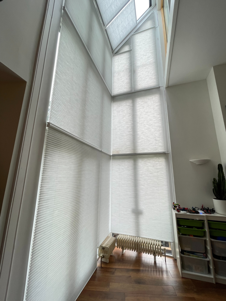 Motorised translucent Duette blinds provide privacy and insulation - The Scottish Shutter Company