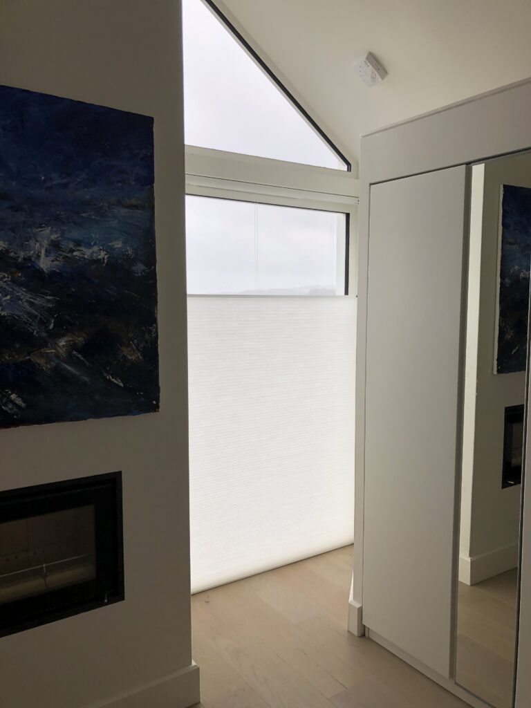 Top-Down, Bottom-Up Duette Blinds in a Bedroom on the Island of Mull by The Scottish Shutter Company