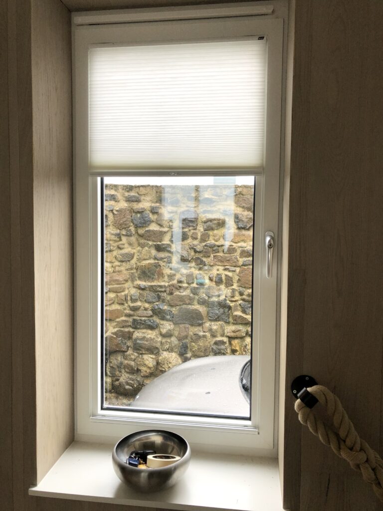 Tensioned Duette Blind on a Tilt-&-Turn Window by The Scottish Shutter Company