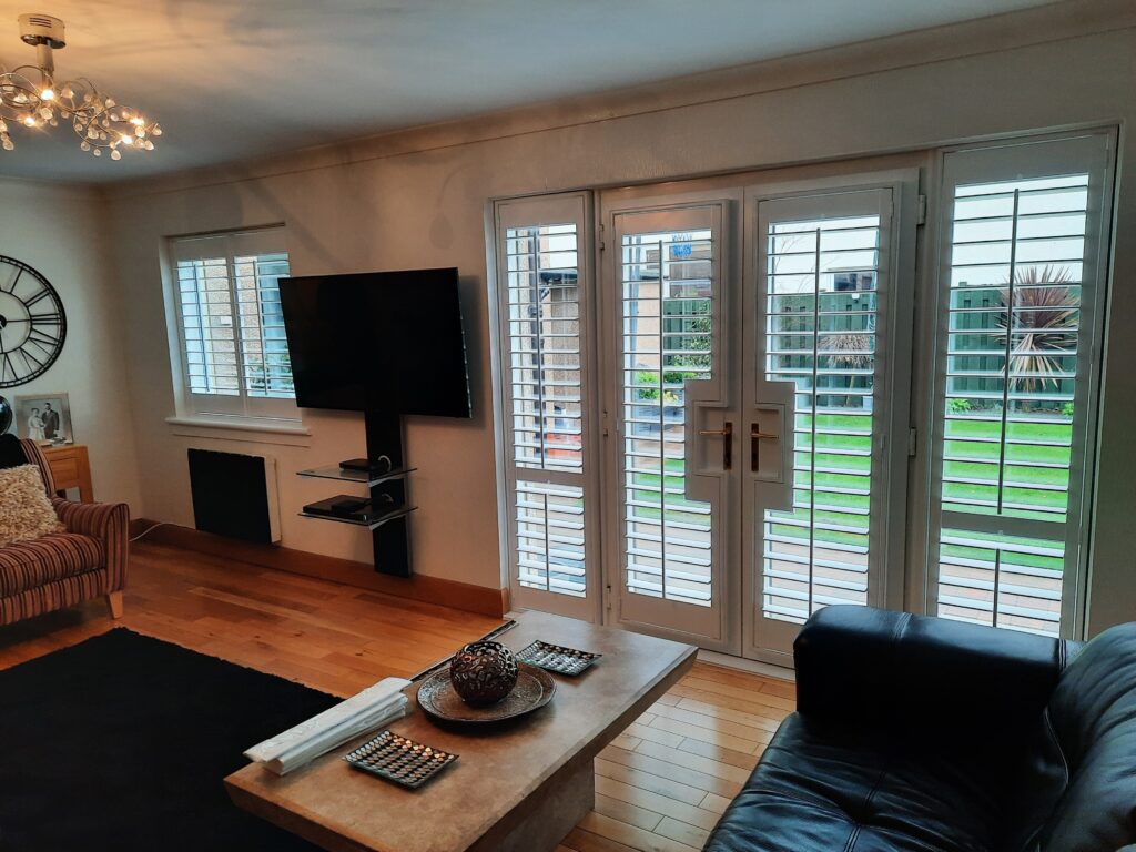 Window Shutters with a French Door Cutout for the Door Handle