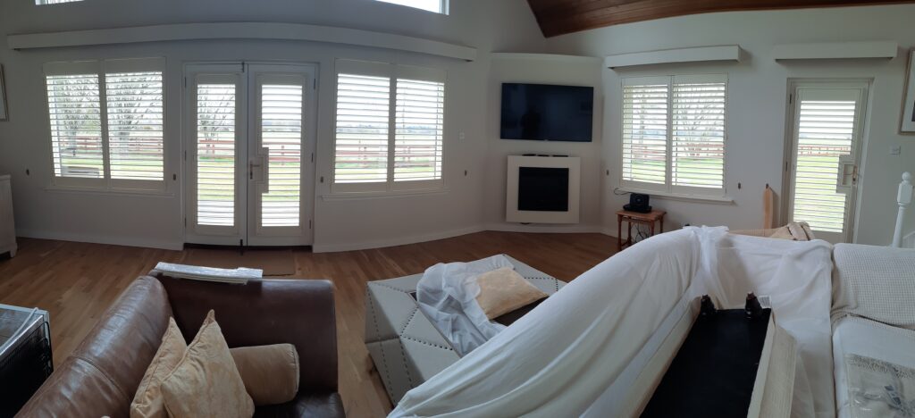 Window Shutters with a French Door Cutout for the Door Handle