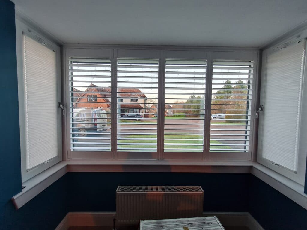 Square Bay Window Shutters with Duette Blinds on Tilt & Turn windows
