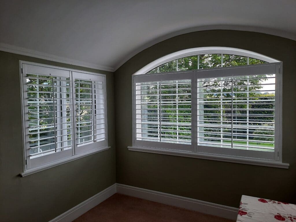 Rectangular Window Shutters in an Arched Window