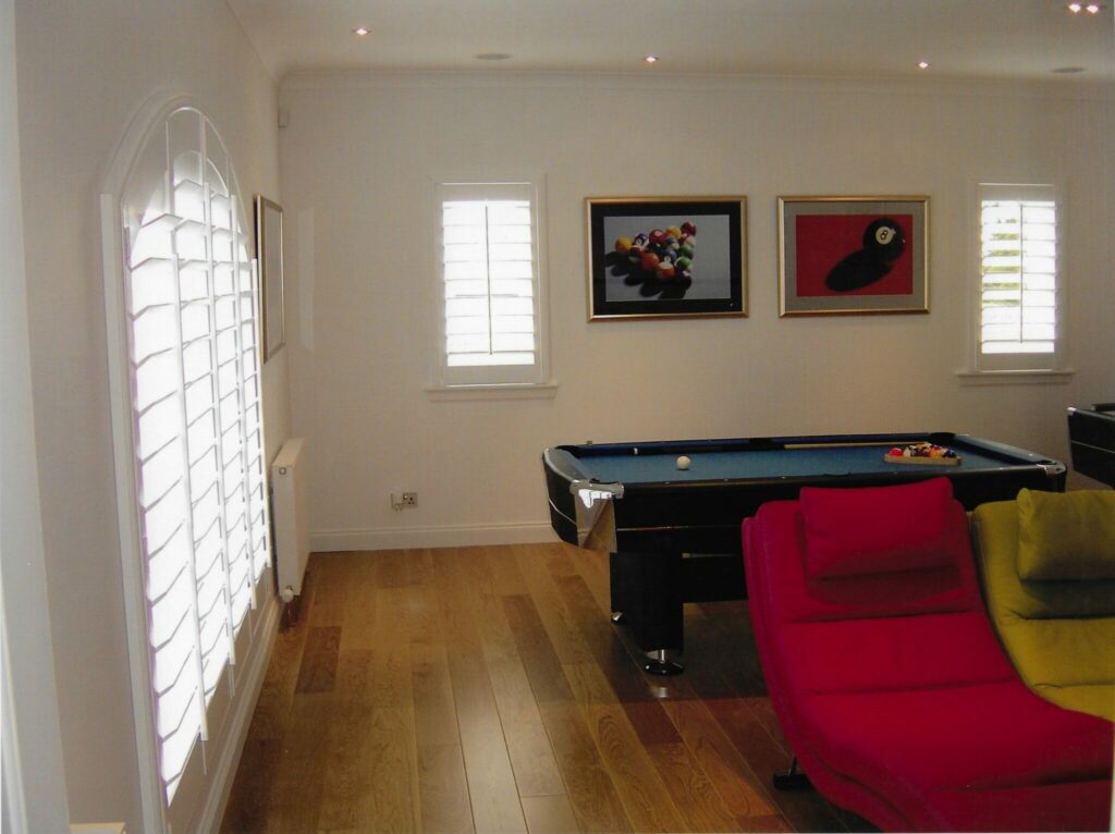 Arched Window Shutters with Large Louvres