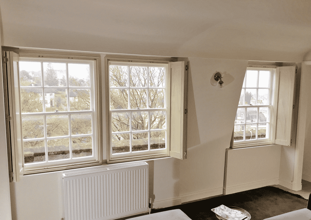 Shaker Style Solid Shutter Panels in a Bedroom by The Scottish Shutter Company