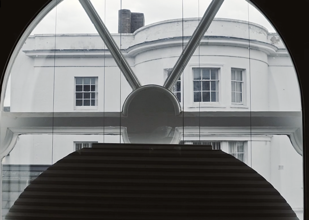 Arched, motorised, stack-at-the-bottom, Duette blind 3