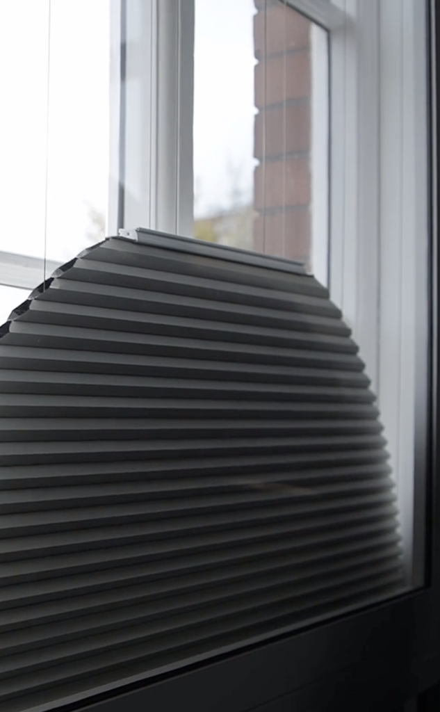 Arched, motorised, stack-at-the-bottom, Duette blind