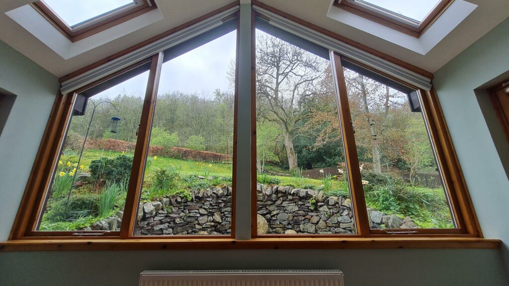 Sona Motorised Cellular Translucent Gable Blinds in the Stacked Position