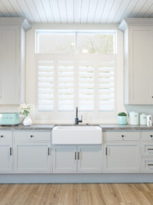 Cafe-Style Shutters for Stylish Kitchen Windows 1 Faux Wood Shutters - in a Kitchen - The Scottish Shutter Company